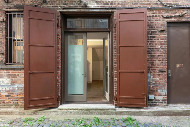 a view of livingroom with furniture and fireplace