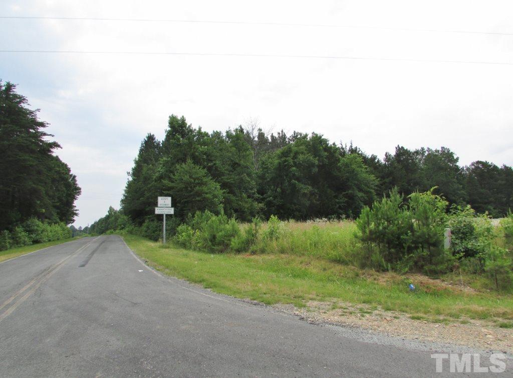 Jim Poole Road Roxboro, NC 27574 - Photo 2 of 11 a view of a grassy field with trees