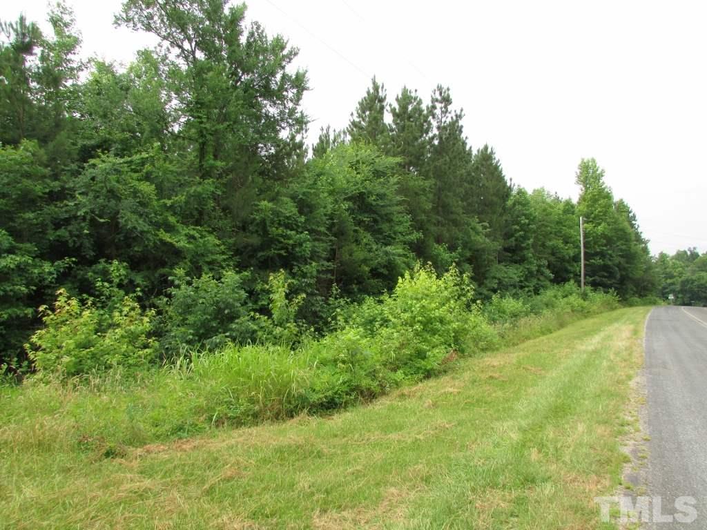 Jim Poole Road Roxboro, NC 27574 - Photo 5 of 11 a view of a field with a tree