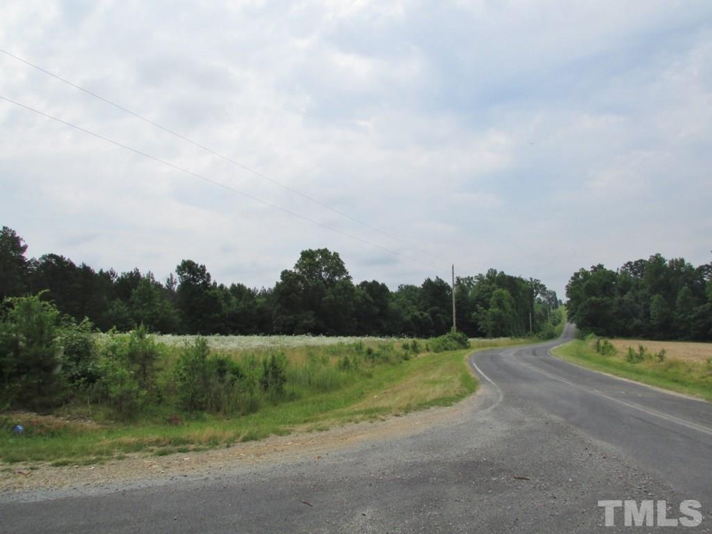 Jim Poole Road Roxboro, NC 27574 - Photo 6 of 11 a view of a field with a small yard