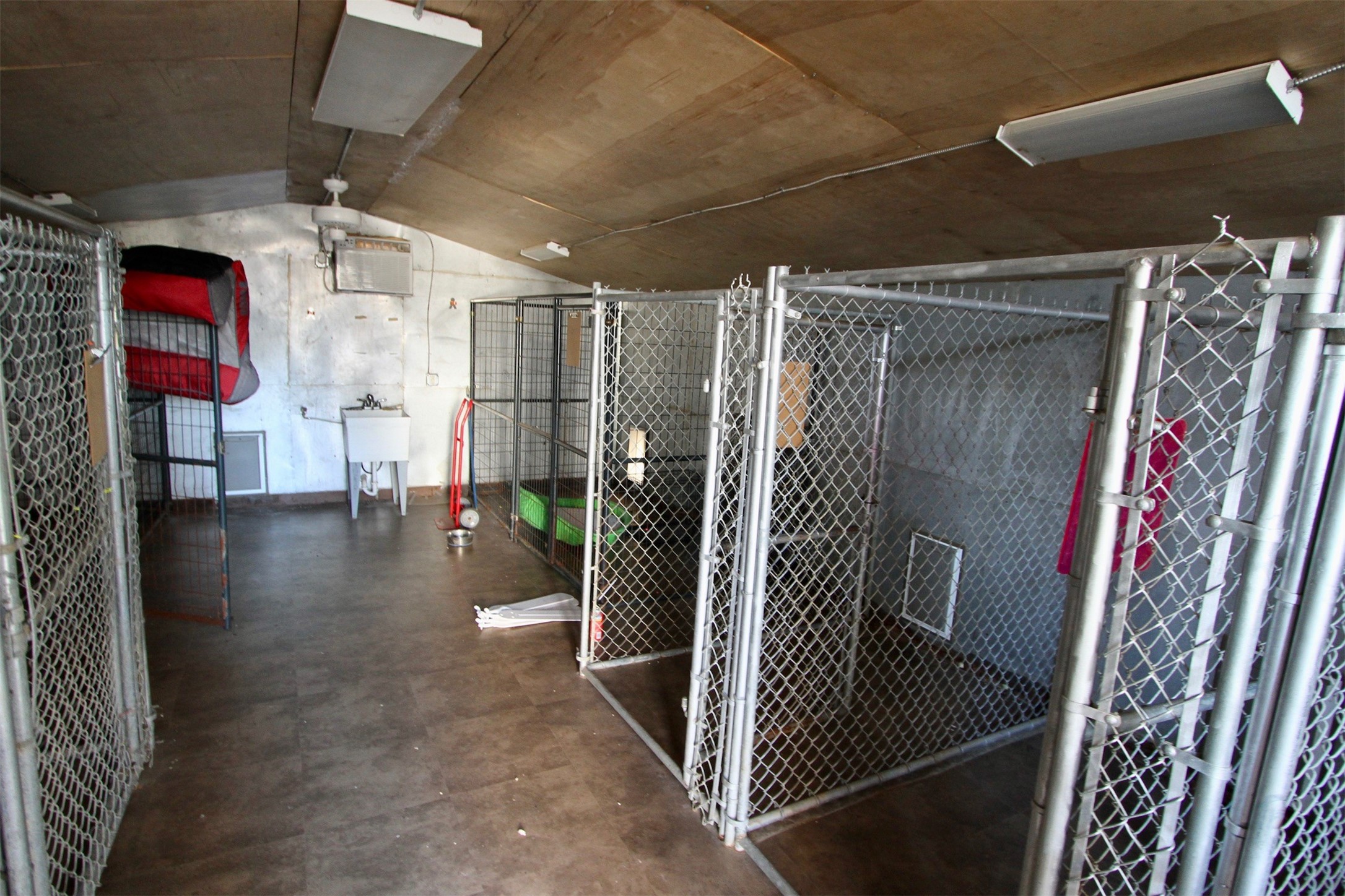 11518 Bogs Road Tomball, TX 77375 - Photo 2 of 18 Inside the wooden building with concrete floors