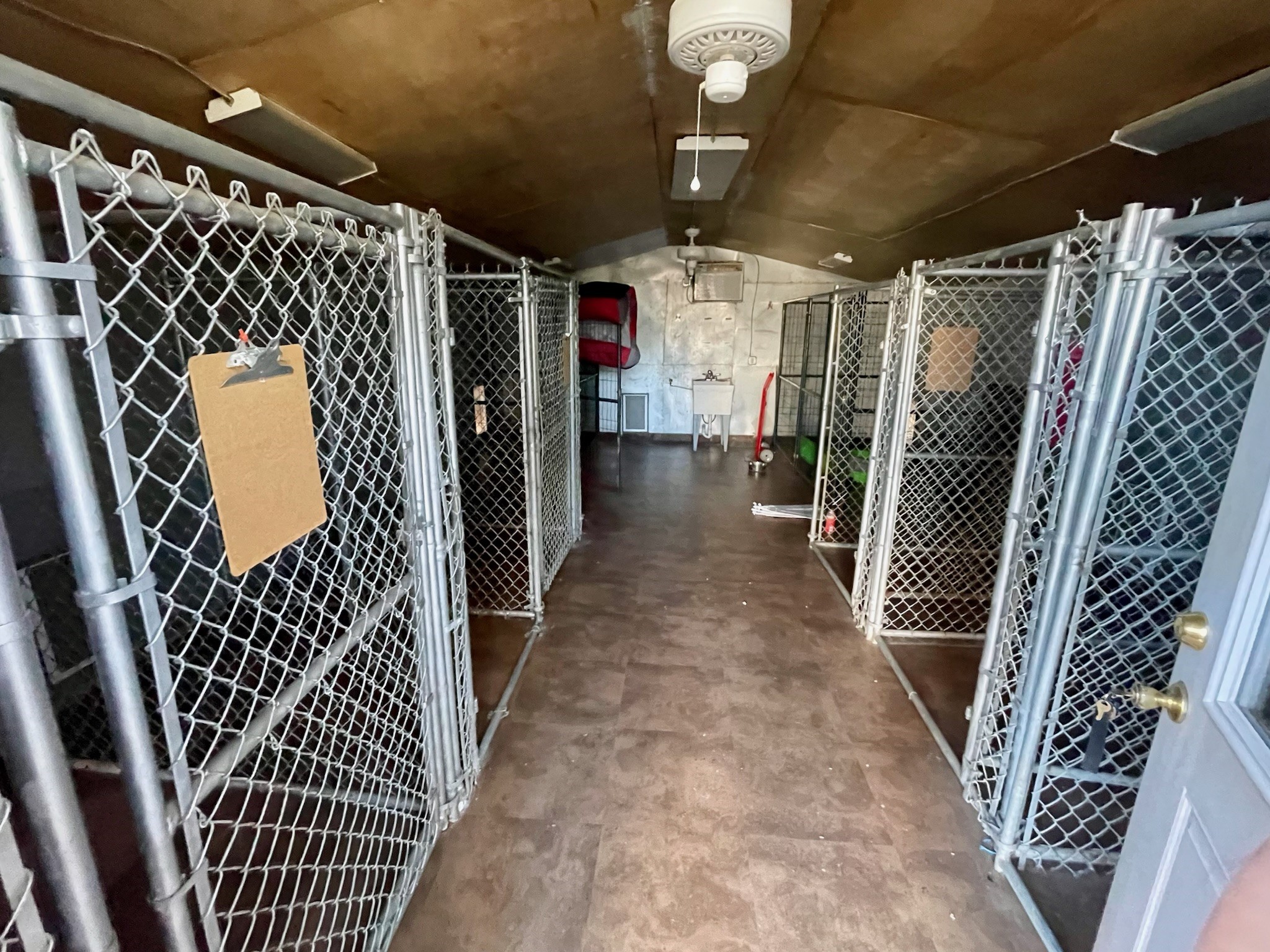 11518 Bogs Road Tomball, TX 77375 - Photo 3 of 18 Inside the wooden kennel building