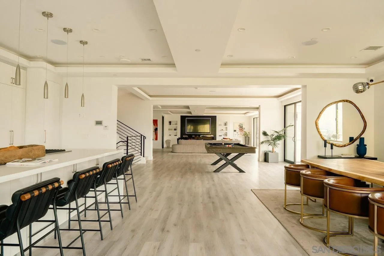 3820 Knobhill Drive Sherman Oaks, CA 91423 - Photo 11 of 75 a living room with furniture a flat screen tv and a table