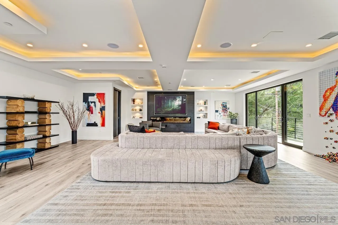 3820 Knobhill Drive Sherman Oaks, CA 91423 - Photo 14 of 75 a living room with furniture and a flat screen tv