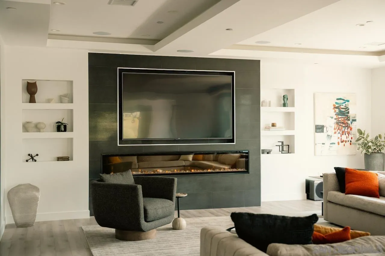 3820 Knobhill Drive Sherman Oaks, CA 91423 - Photo 15 of 75 a living room with furniture and a flat screen tv