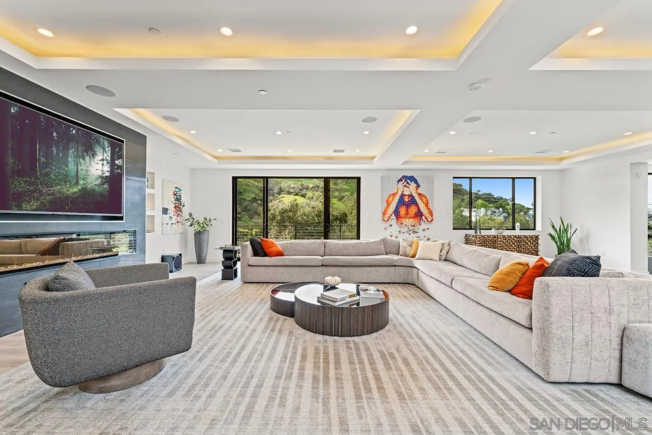 3820 Knobhill Drive Sherman Oaks, CA 91423 - Photo 16 of 75 a living room with furniture and a flat screen tv