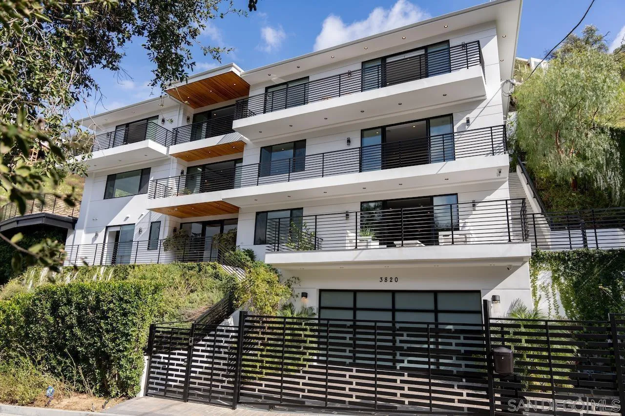 3820 Knobhill Drive Sherman Oaks, CA 91423 - Photo 2 of 75 a front view of a building with glass windows