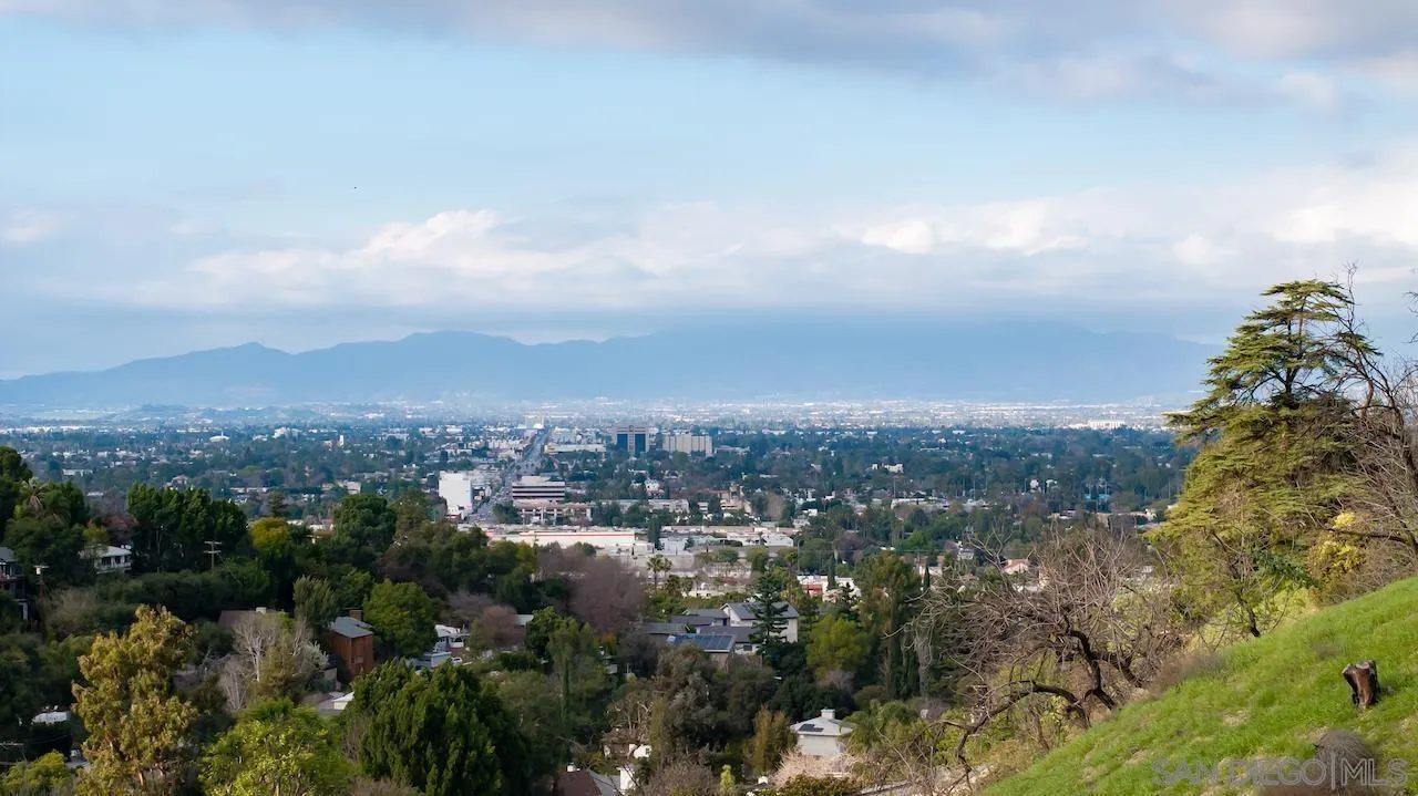 3820 Knobhill Drive Sherman Oaks, CA 91423 - Photo 24 of 75 an aerial view of residential house with green space and fog