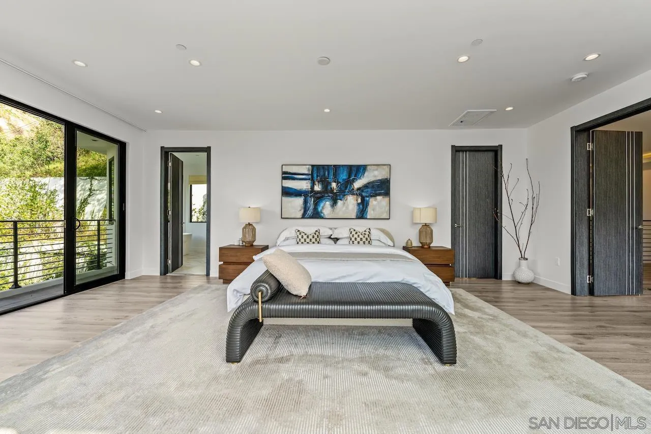 3820 Knobhill Drive Sherman Oaks, CA 91423 - Photo 31 of 75 a bed room with a bed and a large window