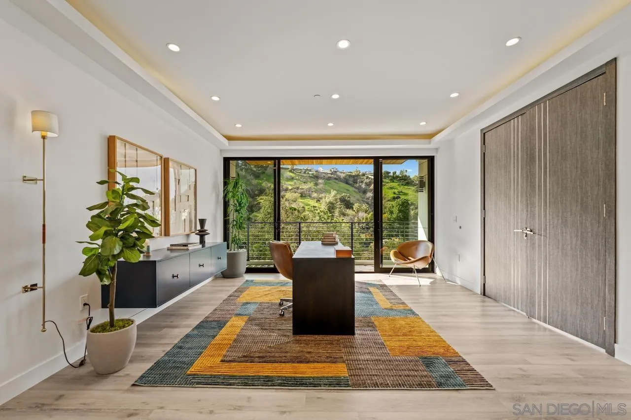 3820 Knobhill Drive Sherman Oaks, CA 91423 - Photo 47 of 75 a living room with a couch and a potted plant