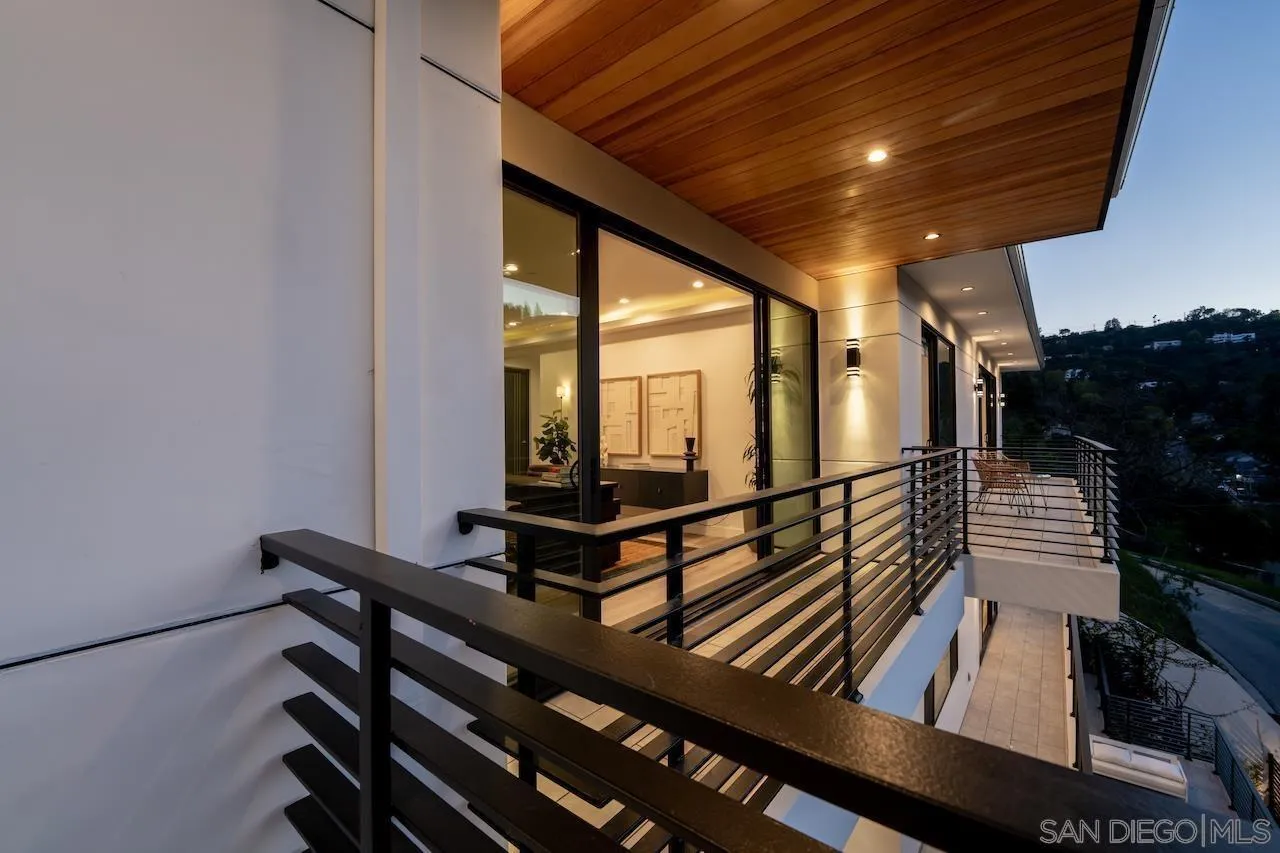 3820 Knobhill Drive Sherman Oaks, CA 91423 - Photo 69 of 75 a view of an empty room with wooden floor and furniture