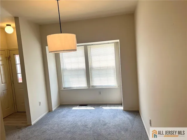 a kitchen with stainless steel appliances a refrigerator and a sink
