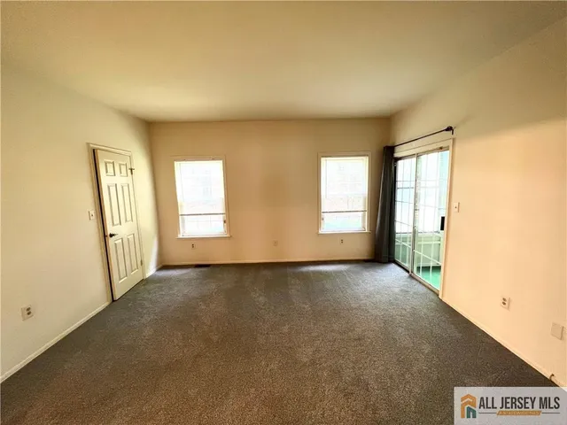 a bathroom with a sink a toilet a mirror and vanity