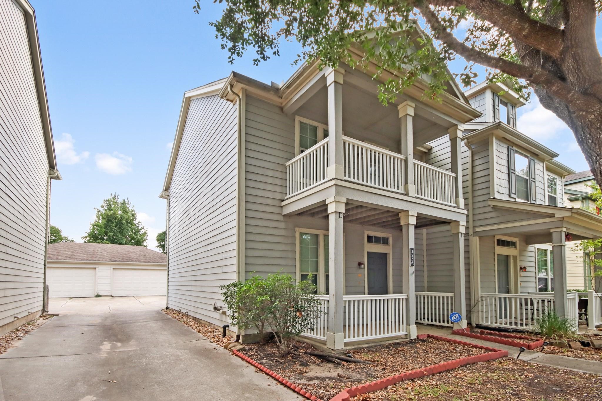 a view of a house with a garden