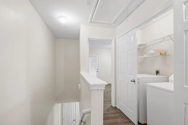 a kitchen with stainless steel appliances granite countertop a refrigerator and a stove