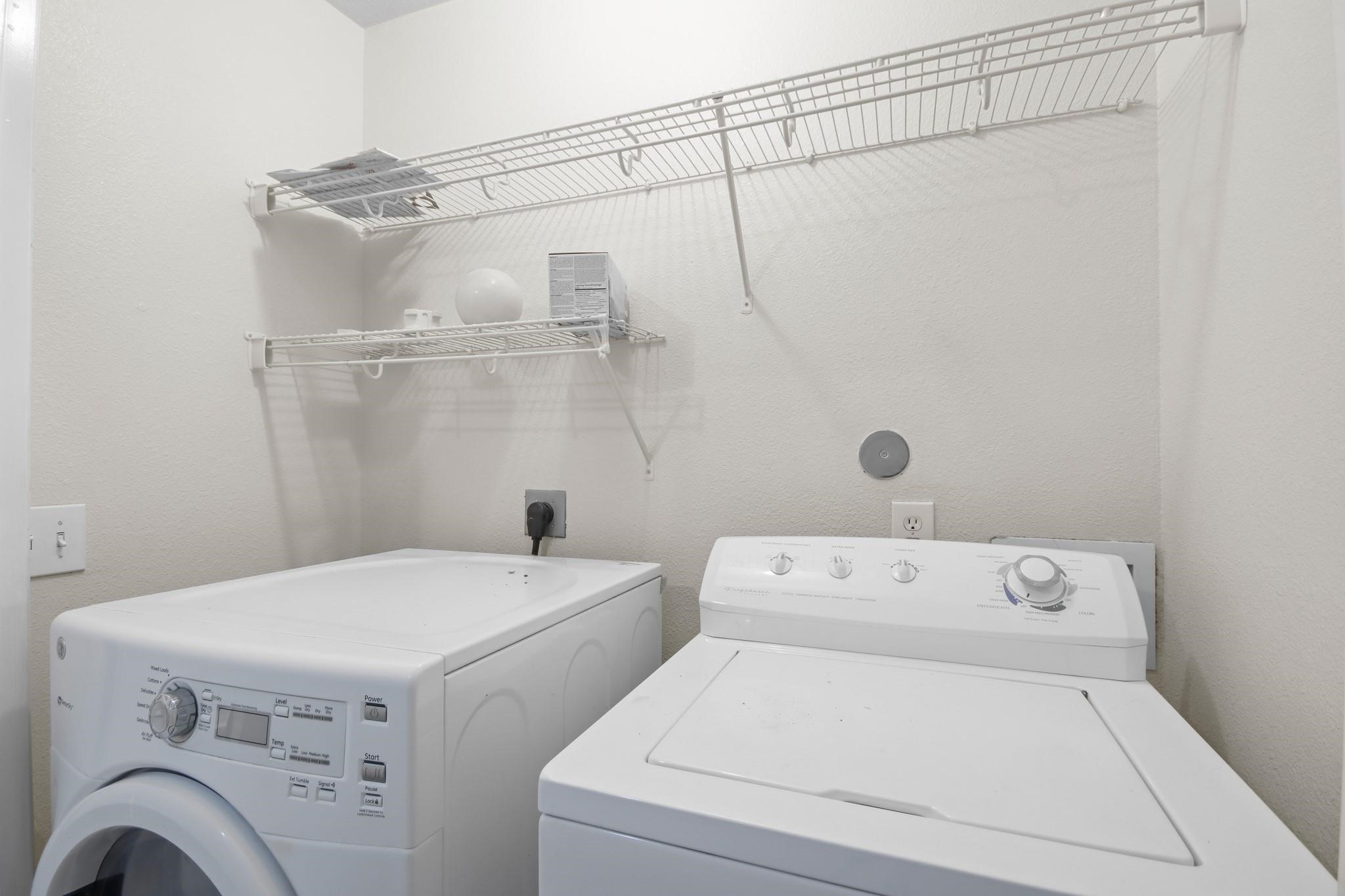 3526 Glenmore Meadow Drive Spring, TX 77386 - Photo 12 of 23 a utility room with dryer and washer