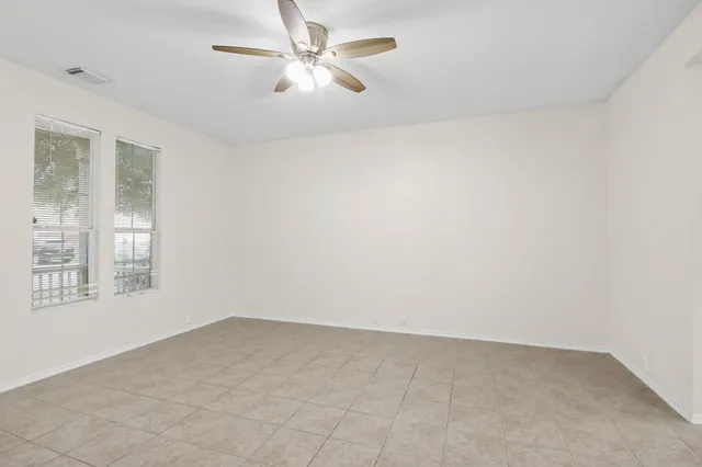 a view of a kitchen with a sink and cabinets