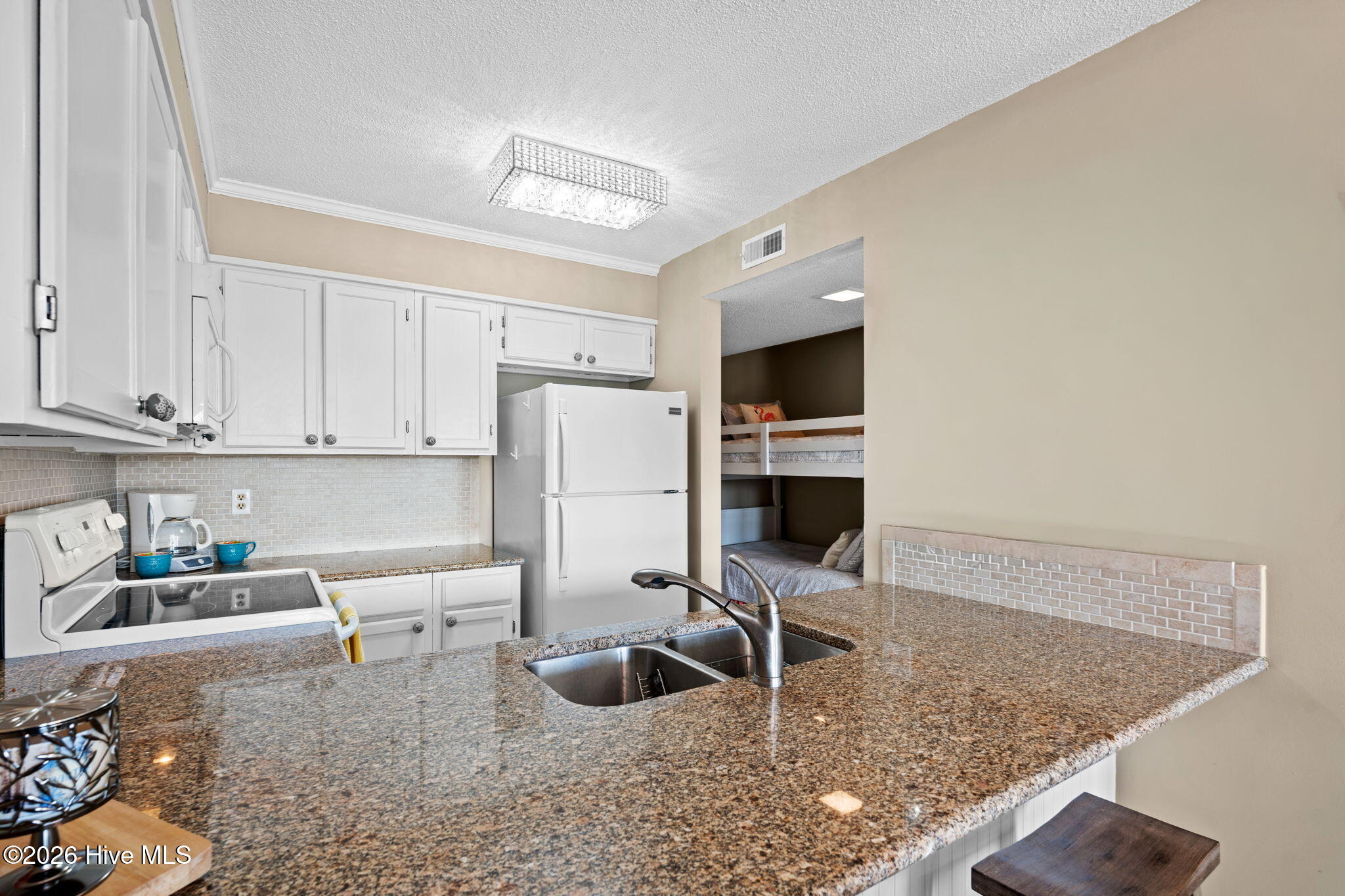 4 Seabrook Road, Unit 2 Ocean Isle Beach, NC 28469 - Photo 11 of 33 Granite counters