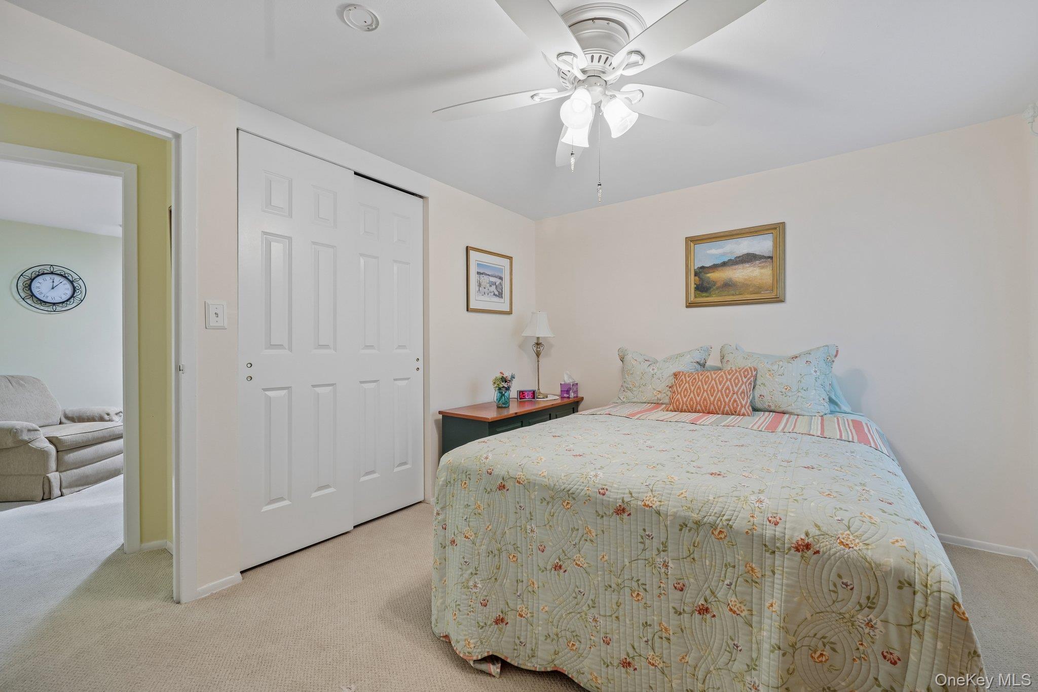 360 Birchwood Road Medford, NY 11763 - Photo 25 of 41 # 2 Sunlit with double closet and golf course view, celing fan