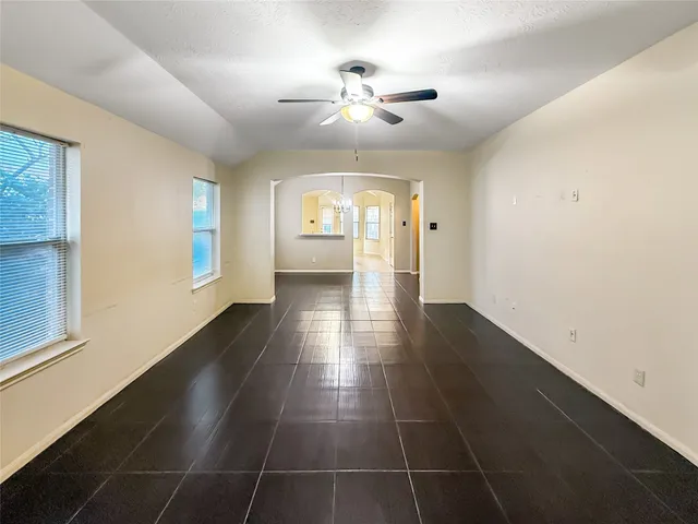 a view of an empty room and window