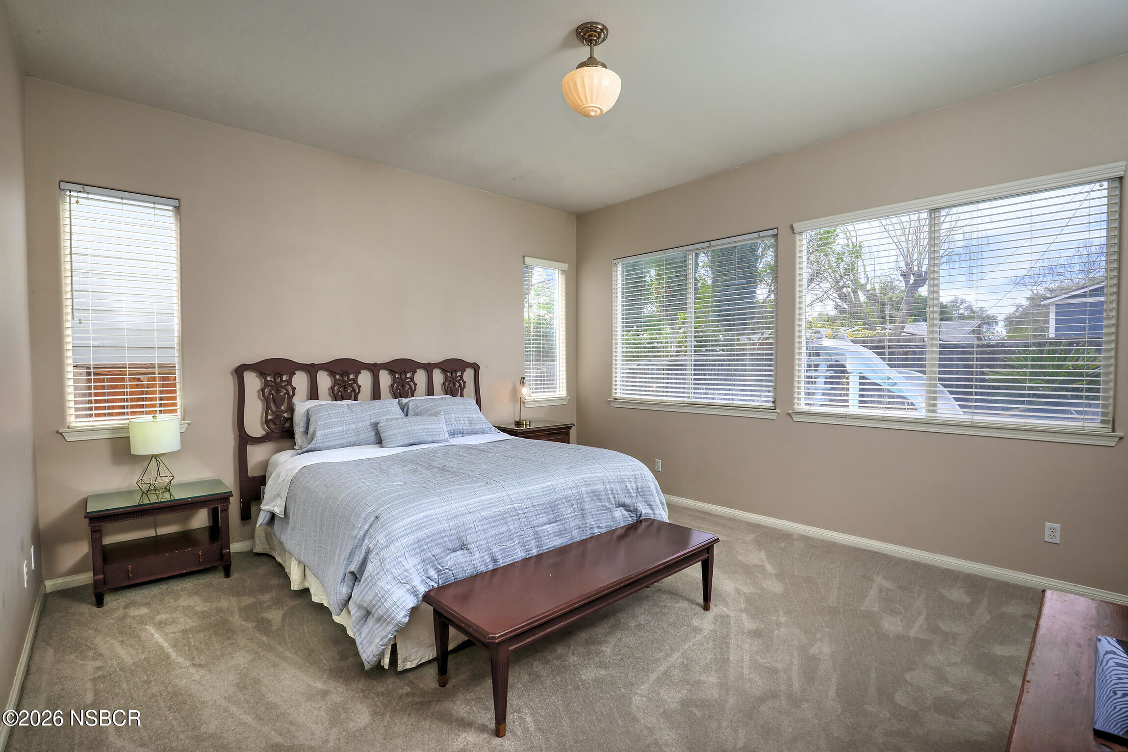 363 Quail Run Road Buellton, CA 93427 - Photo 14 of 25 a bedroom with a bed and a large window