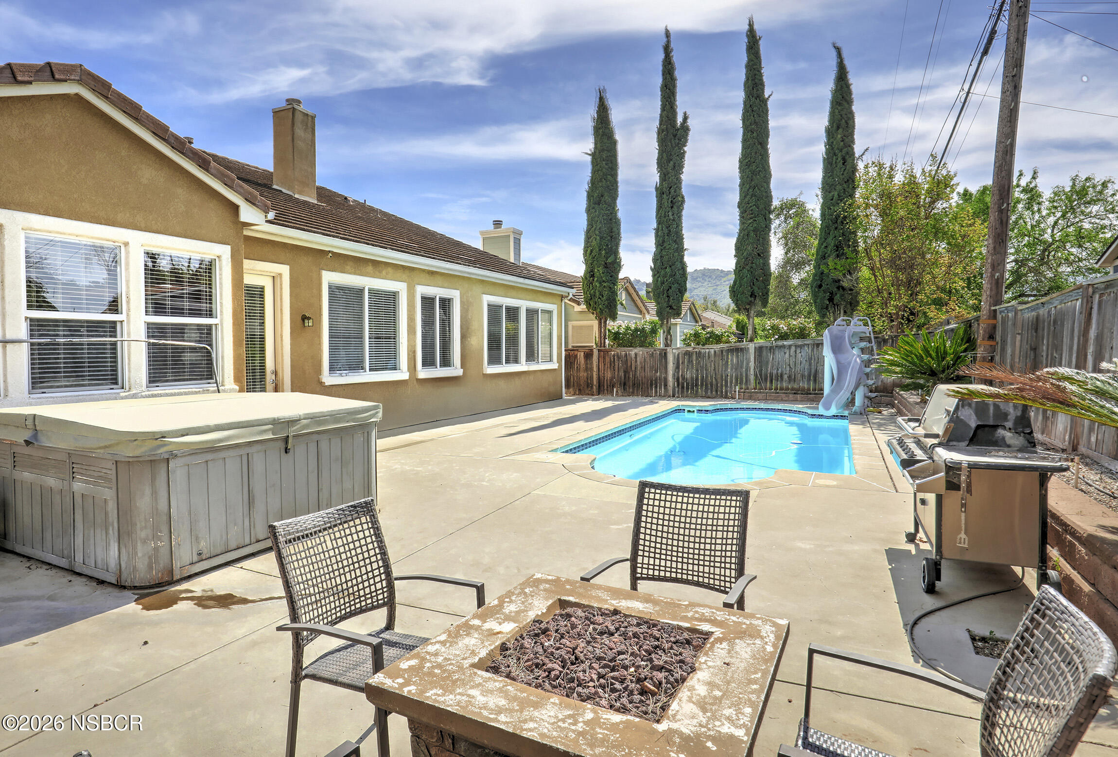 363 Quail Run Road Buellton, CA 93427 - Photo 23 of 25 a view of a patio with couches table and chairs and potted plants