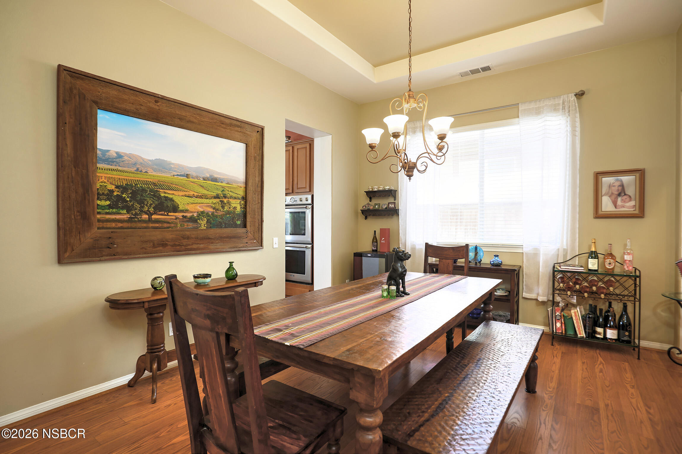 363 Quail Run Road Buellton, CA 93427 - Photo 7 of 25 a dining room with wooden floor and large windows