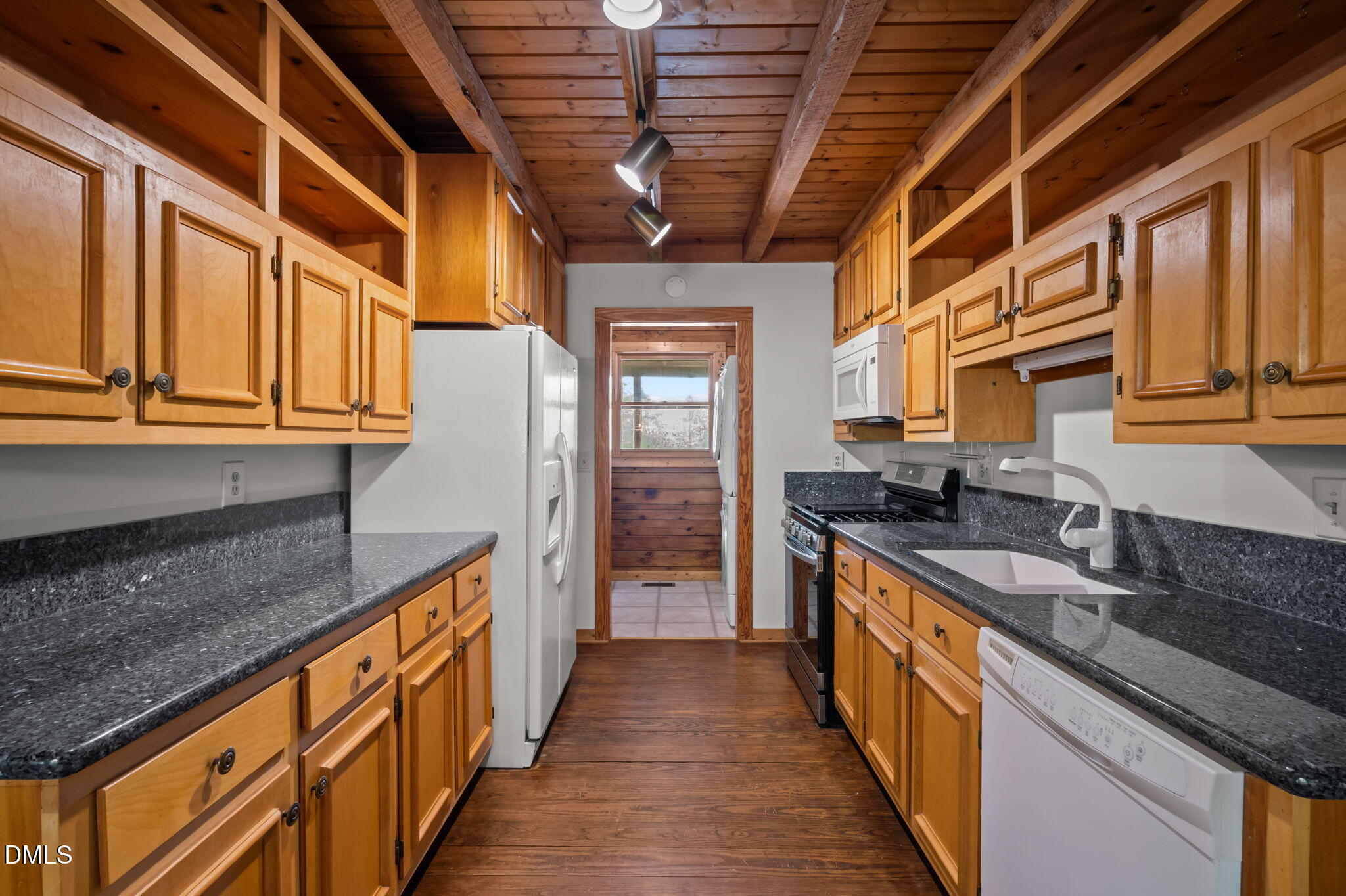 643 Old Stonehouse Road Chapel Hill, NC 27516 - Photo 22 of 63 a kitchen with stainless steel appliances granite countertop a sink stove and cabinets