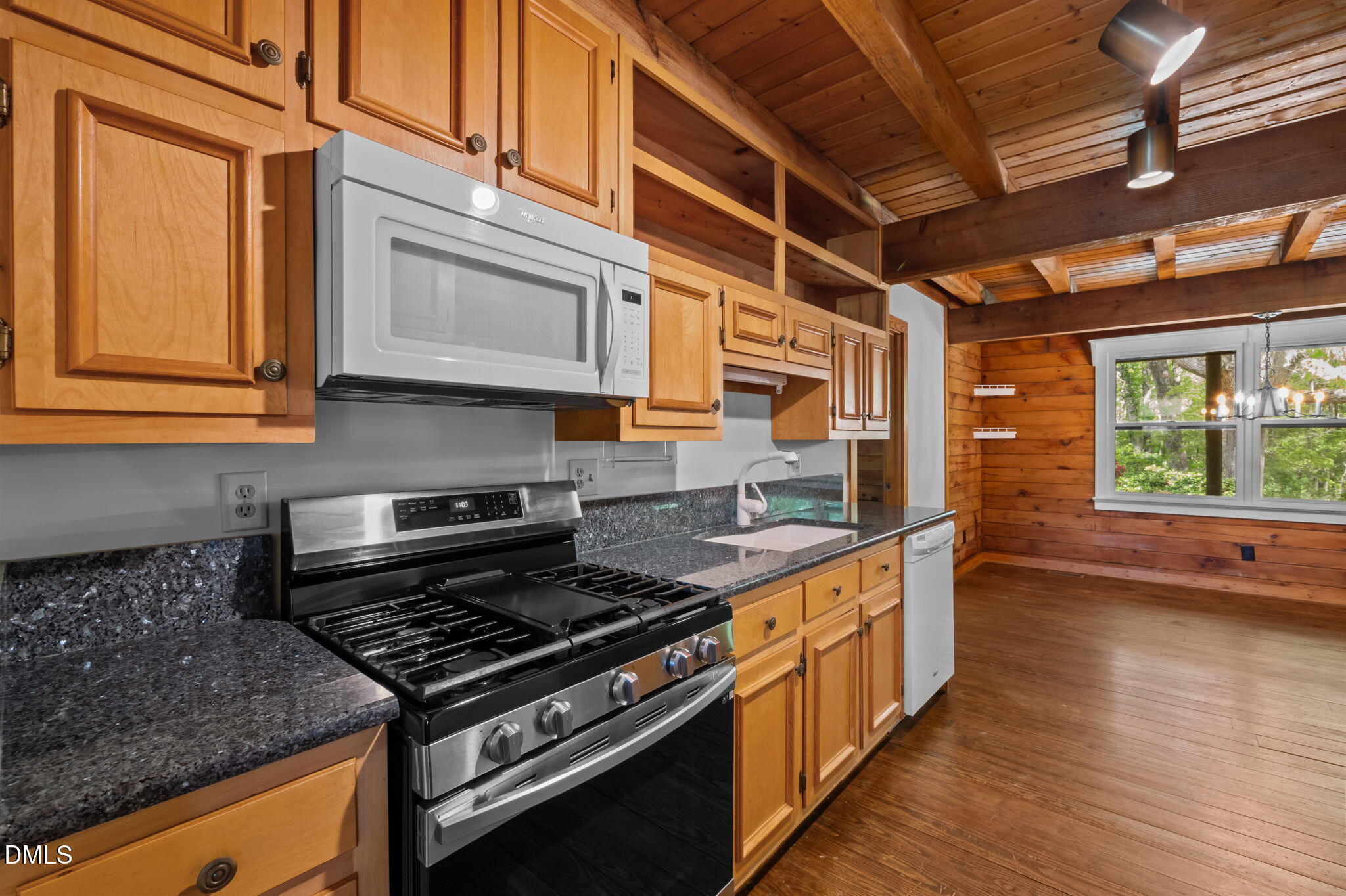 643 Old Stonehouse Road Chapel Hill, NC 27516 - Photo 23 of 63 a kitchen with stainless steel appliances granite countertop a stove and a wooden cabinets