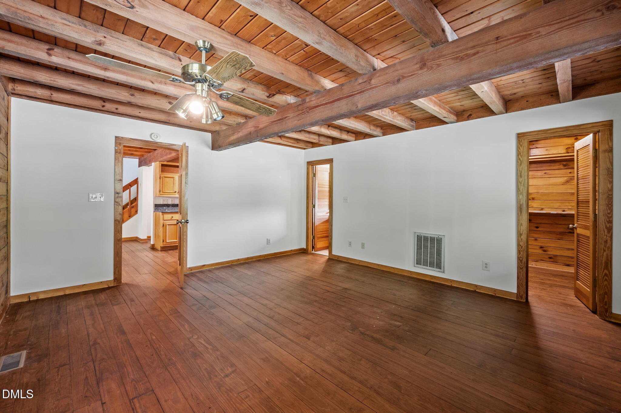 643 Old Stonehouse Road Chapel Hill, NC 27516 - Photo 27 of 63 a view of an empty room with wooden floor
