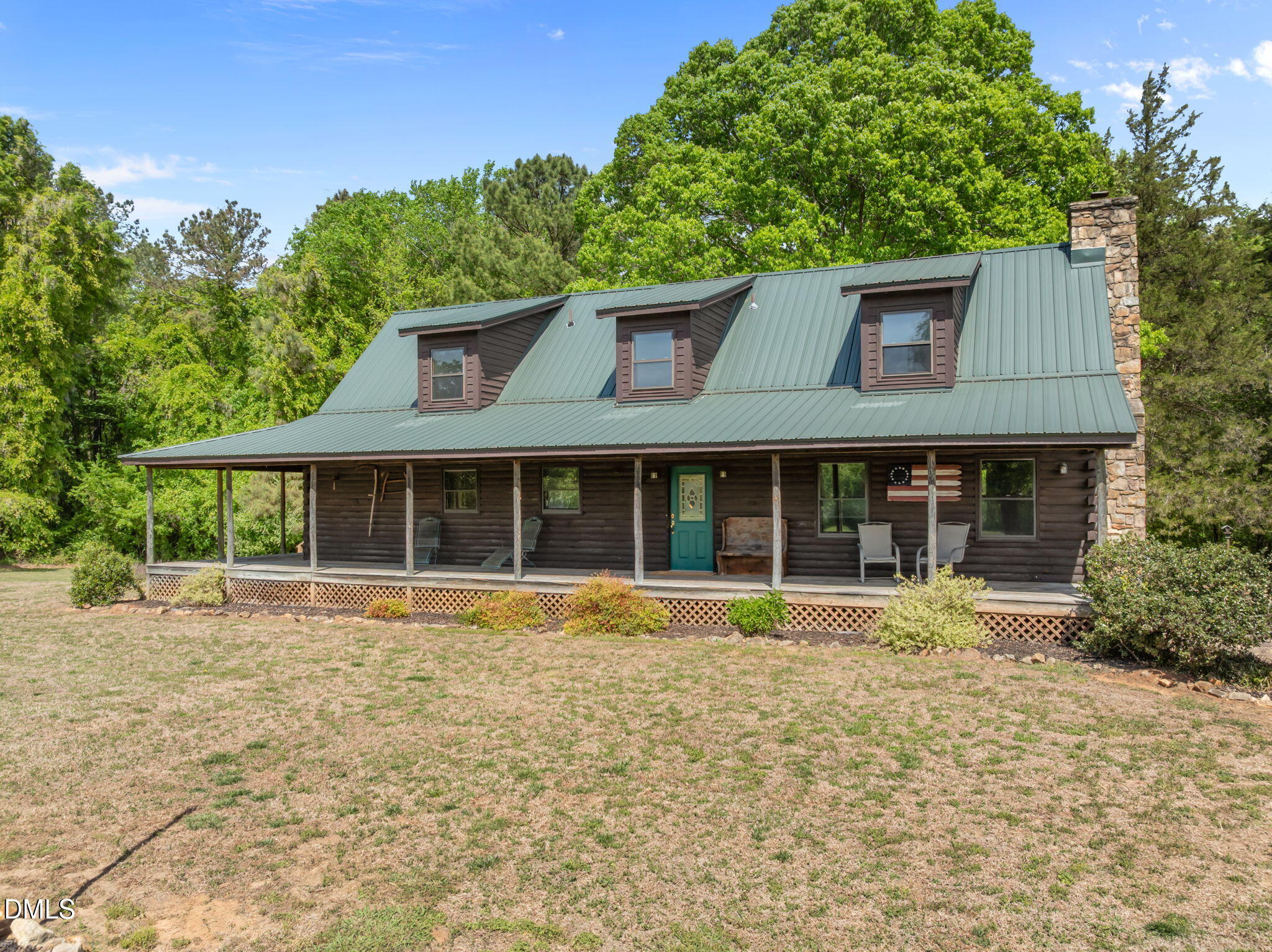 643 Old Stonehouse Road Chapel Hill, NC 27516 - Photo 2 of 63 a front view of a house with a garden