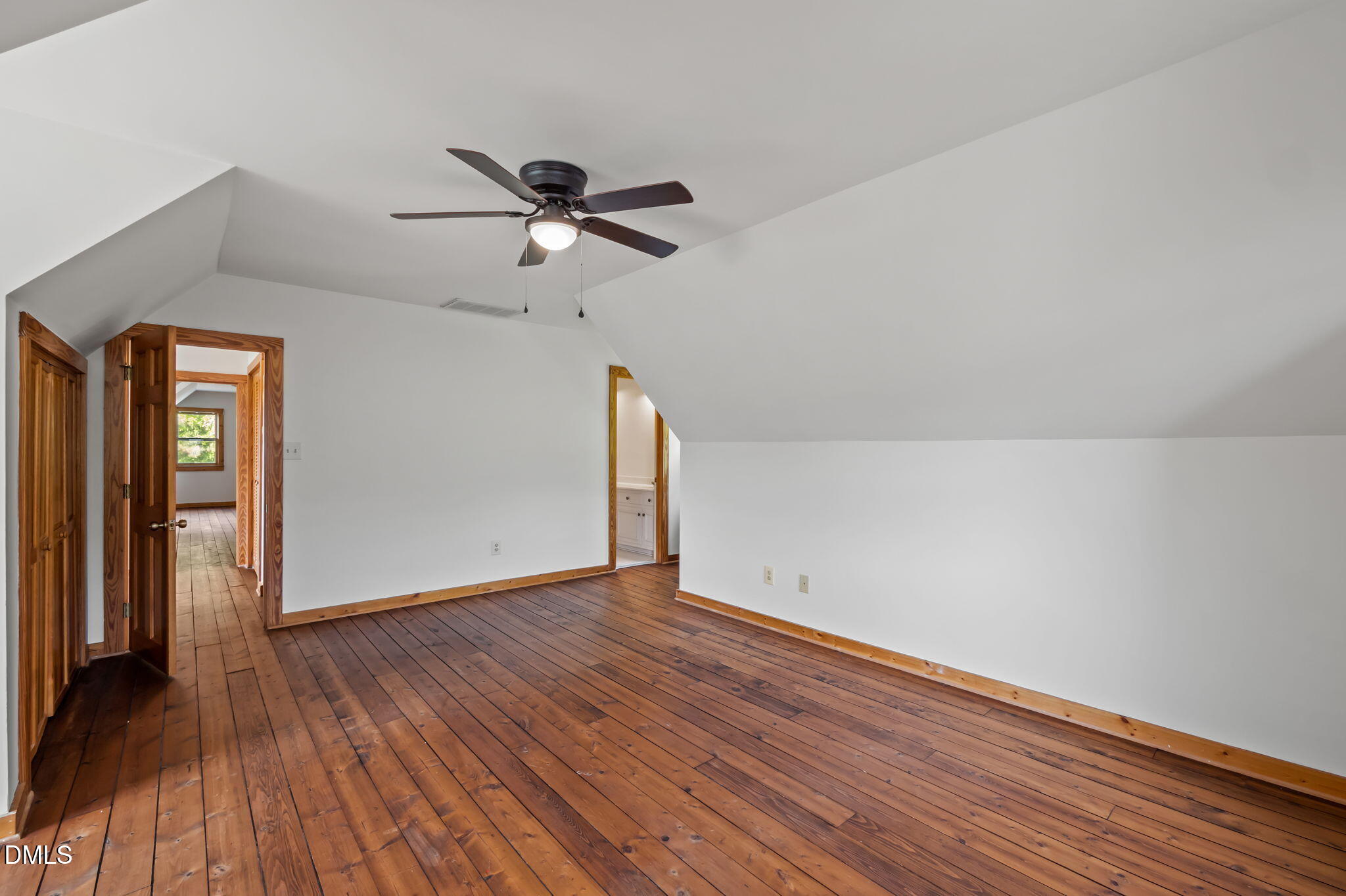 643 Old Stonehouse Road Chapel Hill, NC 27516 - Photo 34 of 63 a view of empty room with wooden floor and fan