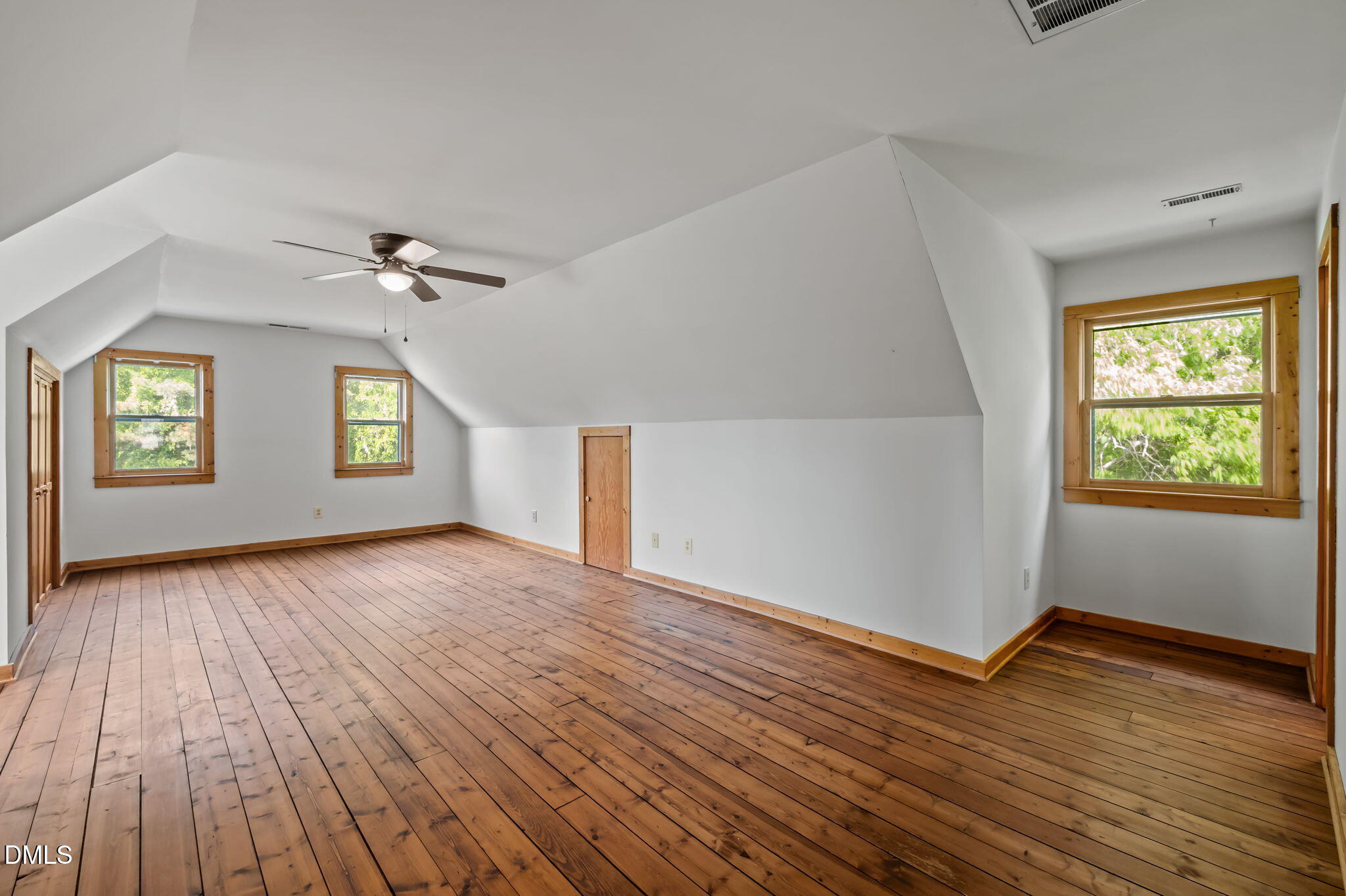643 Old Stonehouse Road Chapel Hill, NC 27516 - Photo 37 of 63 wooden floor in an empty room with a window