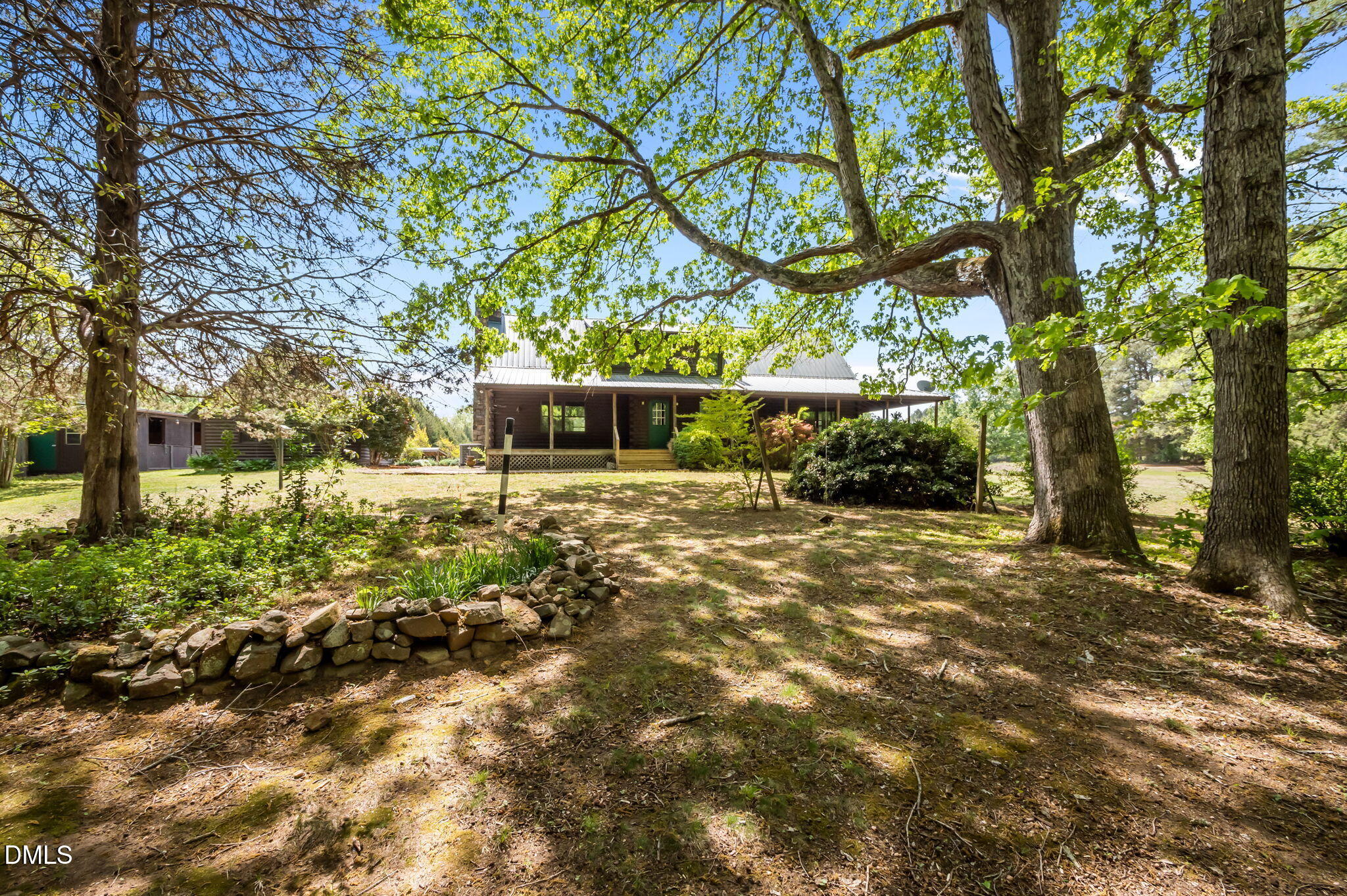 643 Old Stonehouse Road Chapel Hill, NC 27516 - Photo 49 of 63 a view of a yard with plants and trees