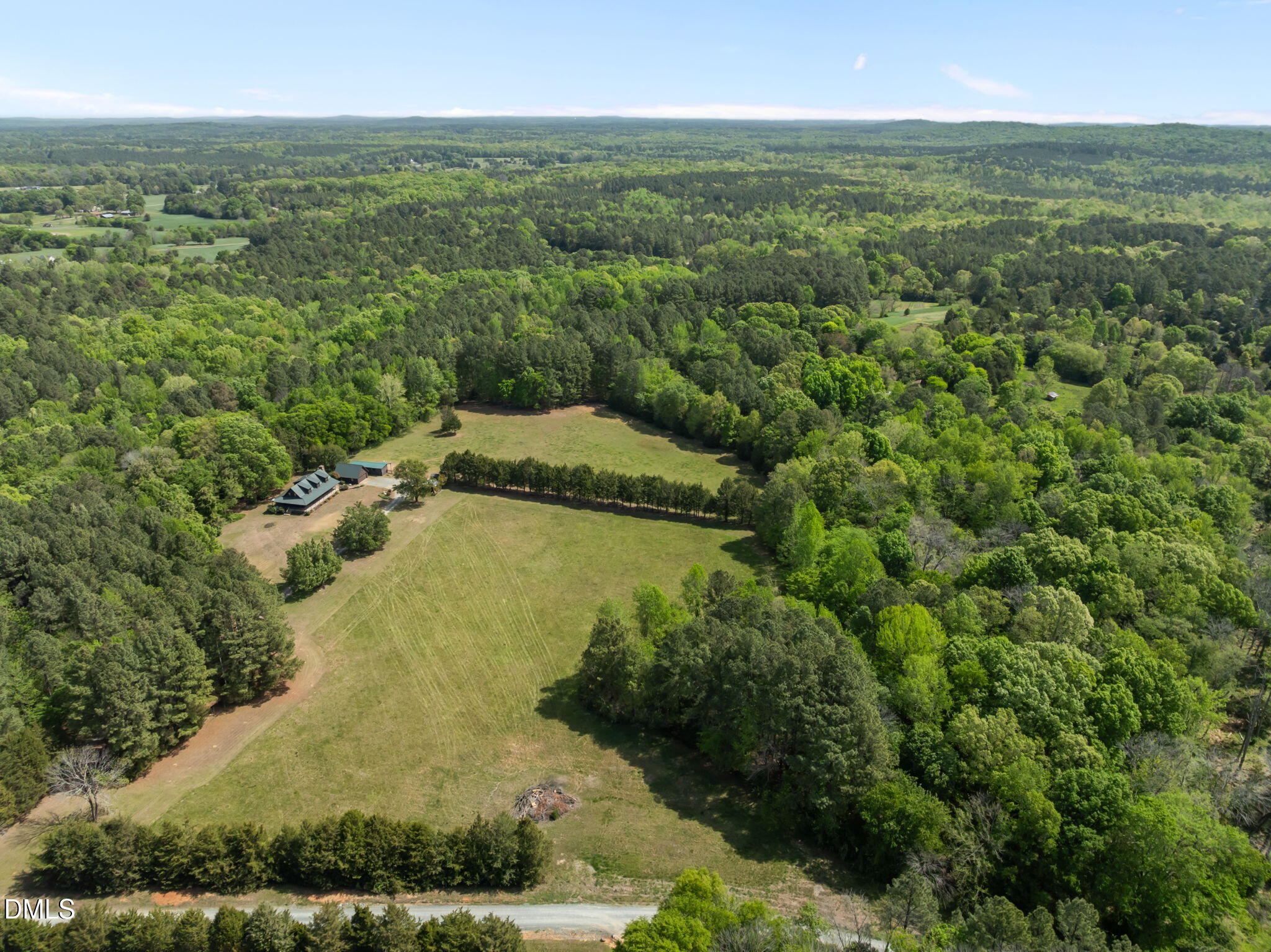 643 Old Stonehouse Road Chapel Hill, NC 27516 - Photo 57 of 63 an aerial view of residential houses with outdoor space and trees