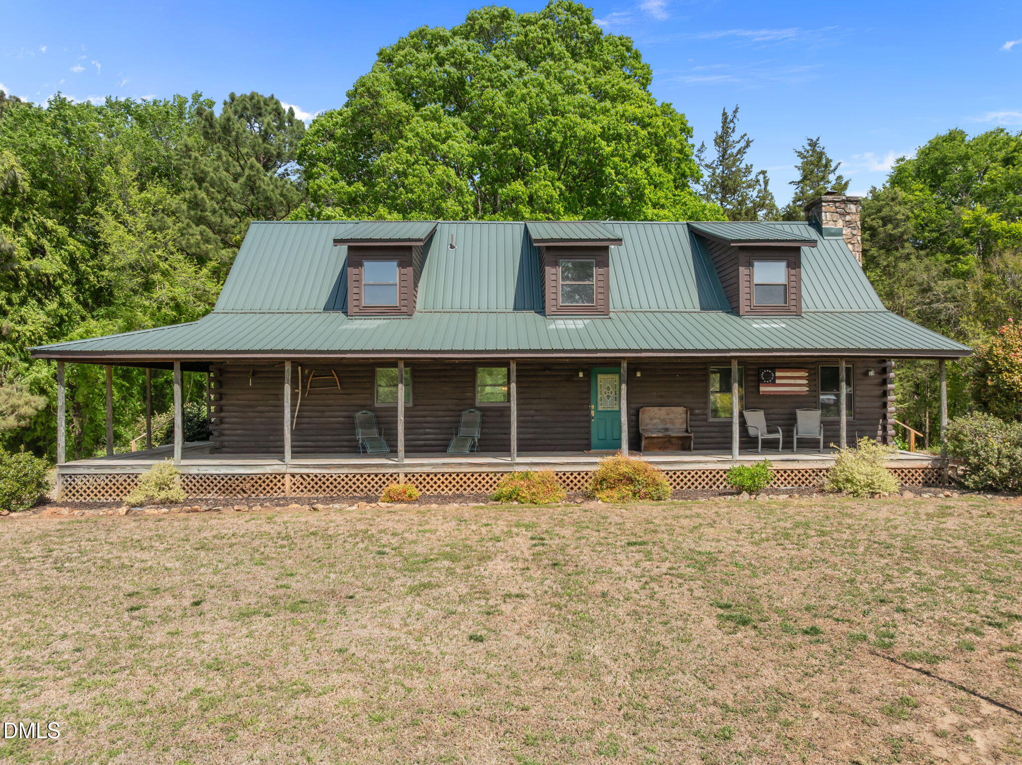 643 Old Stonehouse Road Chapel Hill, NC 27516 - Photo 60 of 63 a front view of a house with a yard