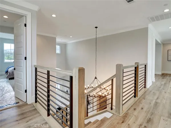 a view of a hallway with seating area