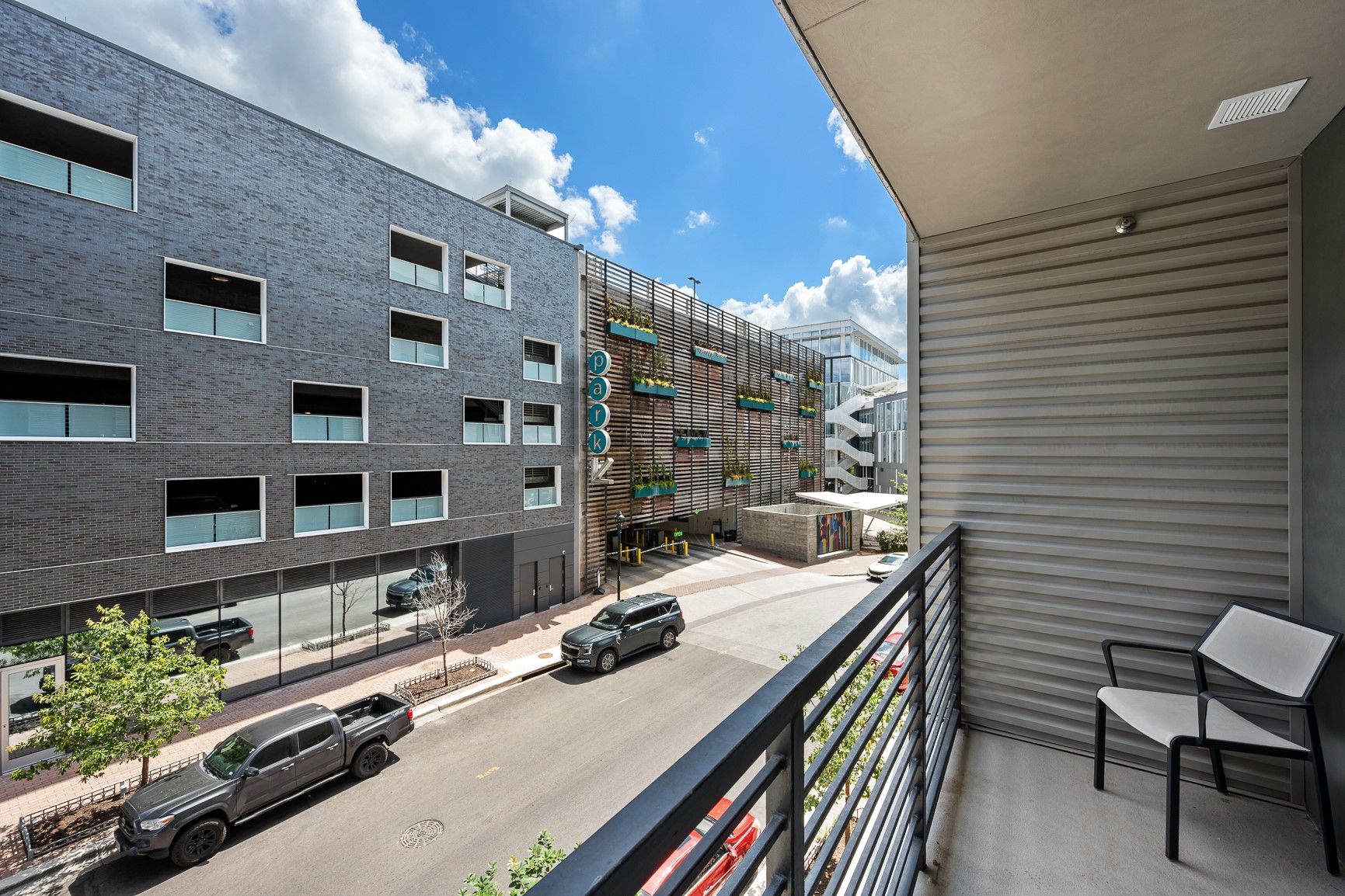 1701 Simond Avenue, Unit 201 Austin, TX 78723 - Photo 12 of 20 a view of a patio with a table and chairs and potted plants