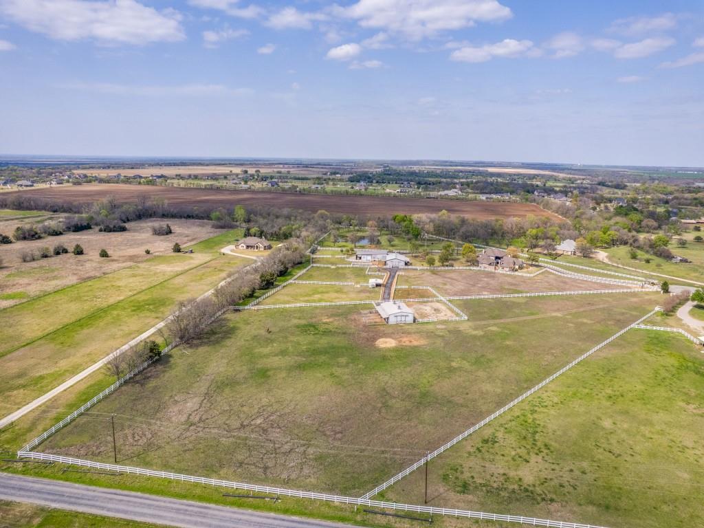 136 Parkside Court Gunter, TX 75058 - Photo 1 of 13 a view of an ocean and beach