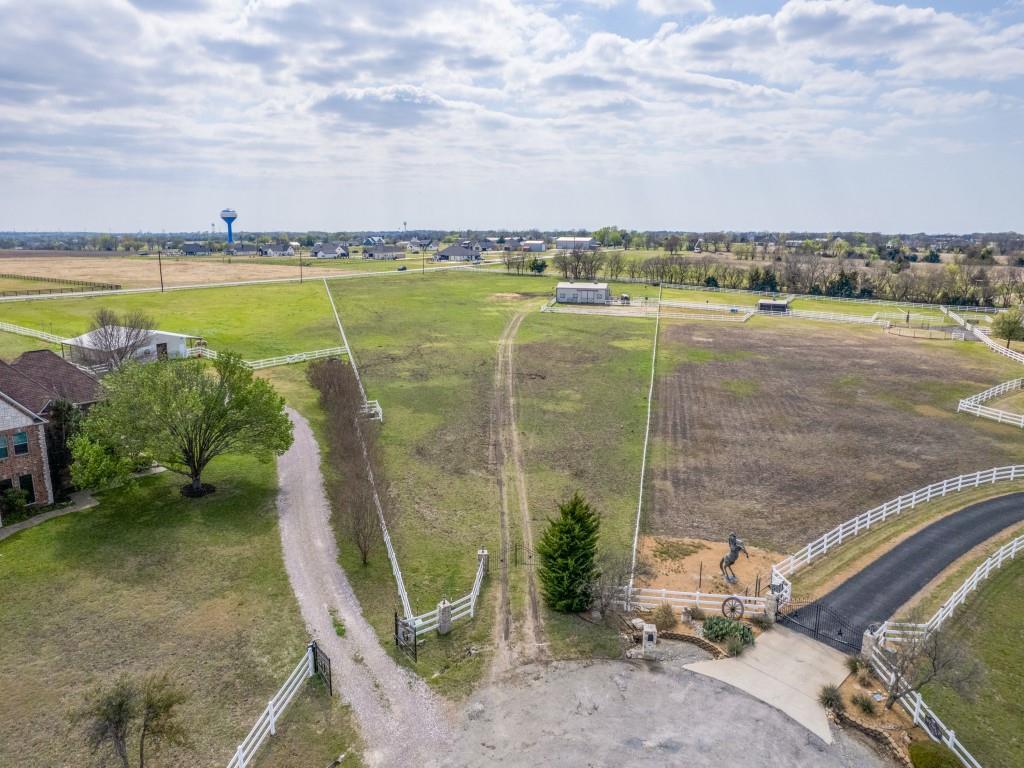 136 Parkside Court Gunter, TX 75058 - Photo 13 of 13 a view of a lake with a yard