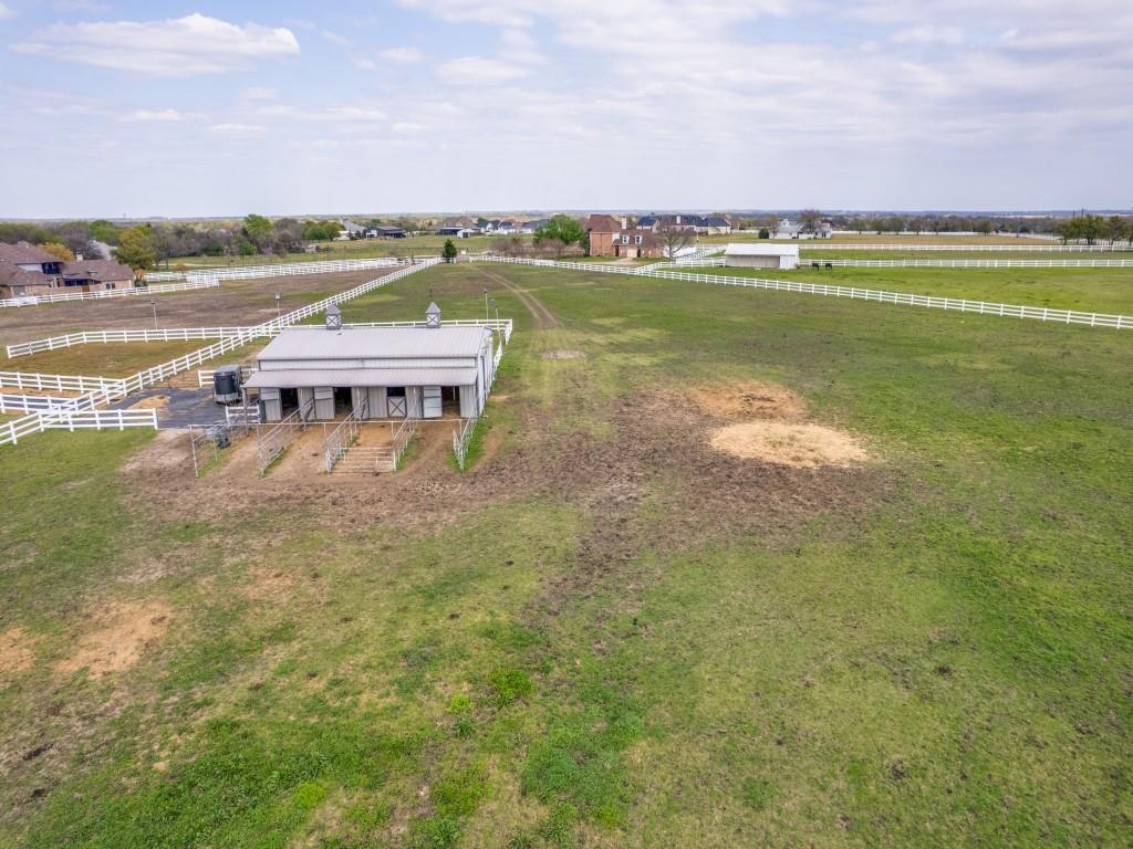 136 Parkside Court Gunter, TX 75058 - Photo 2 of 13 a view of building with lake view and mountain view