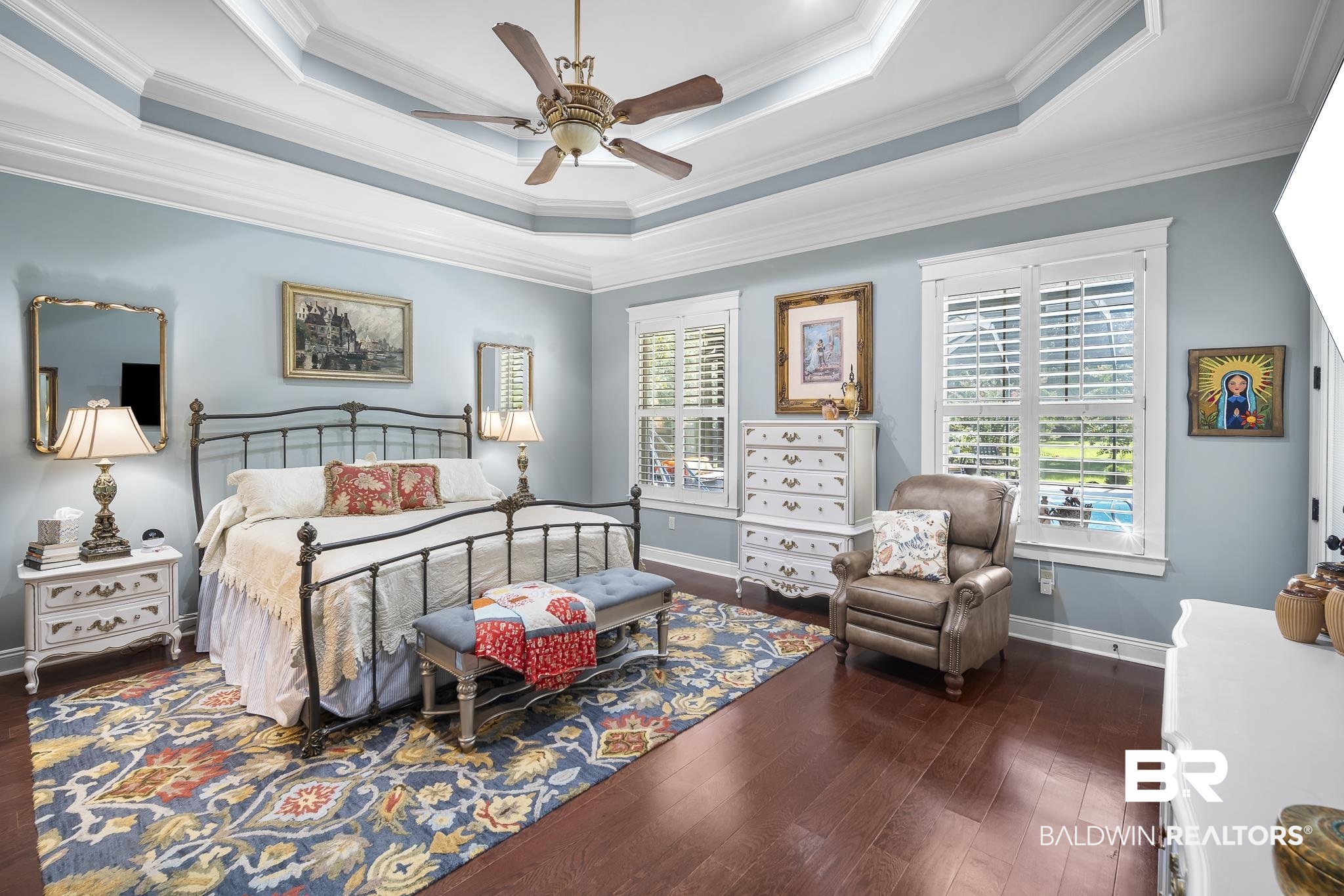 25212 Austin Road Daphne, AL 36526 - Photo 28 of 56 Bedroom with a raised ceiling, ornamental molding, dark wood-type flooring, and a ceiling fan