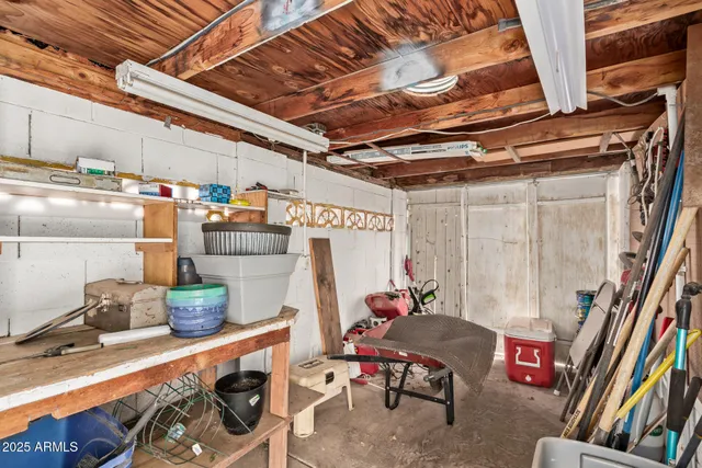 a utility room with sink dryer and washer