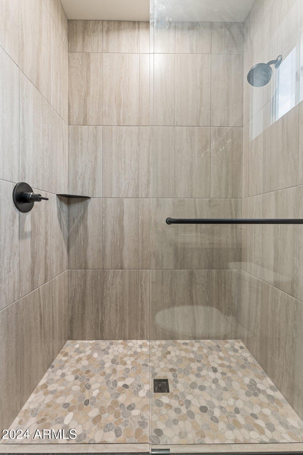 18473 Henry Coe Road Peeples Valley, AZ 86332 - Photo 18 of 31 a bathroom with a shower
