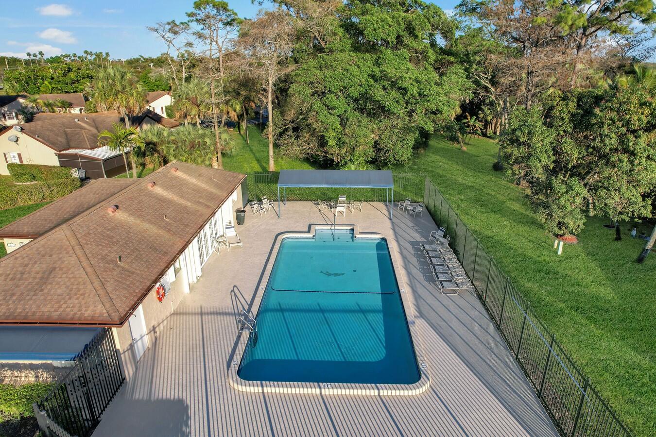 22355 Southwest 57th Circle Boca Raton, FL 33428 - Photo 22 of 25 a view of a yard with plants