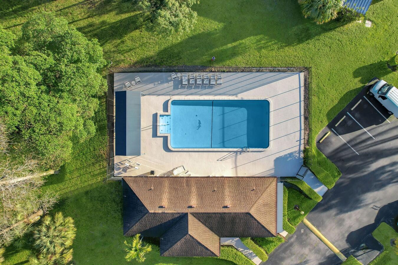 22355 Southwest 57th Circle Boca Raton, FL 33428 - Photo 24 of 25 a view of a house with a yard