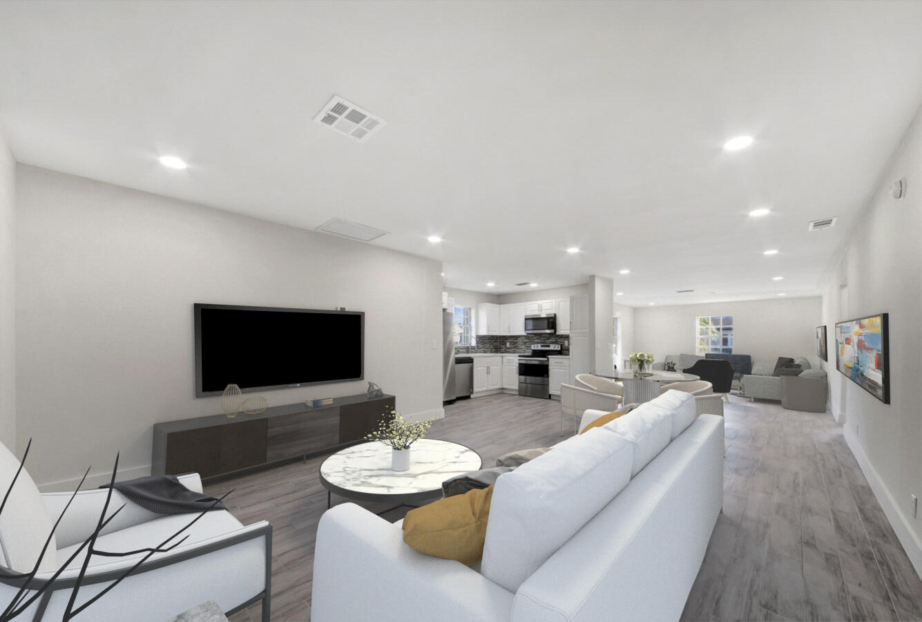 22355 Southwest 57th Circle Boca Raton, FL 33428 - Photo 3 of 25 a living room with furniture kitchen view and a flat screen tv