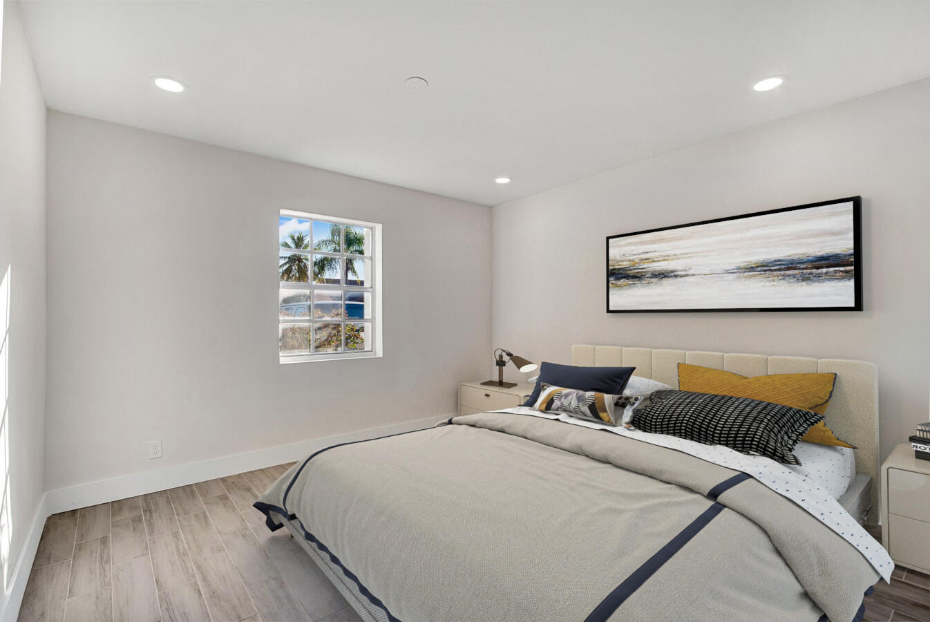 22355 Southwest 57th Circle Boca Raton, FL 33428 - Photo 8 of 25 a bedroom with a bed and wooden floor