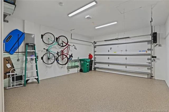 a view of a backyard with potted plants