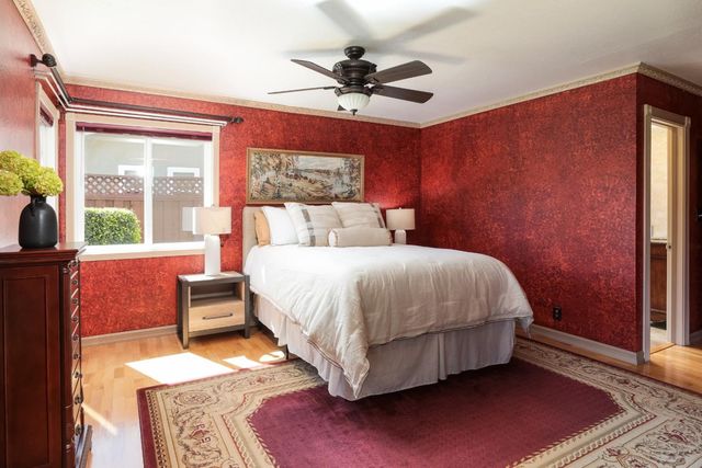 a bed room with a bed and a couch